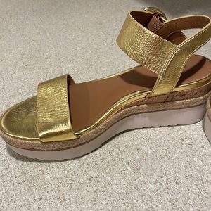 27 EDIT gold wedge sandals in size 6.5.